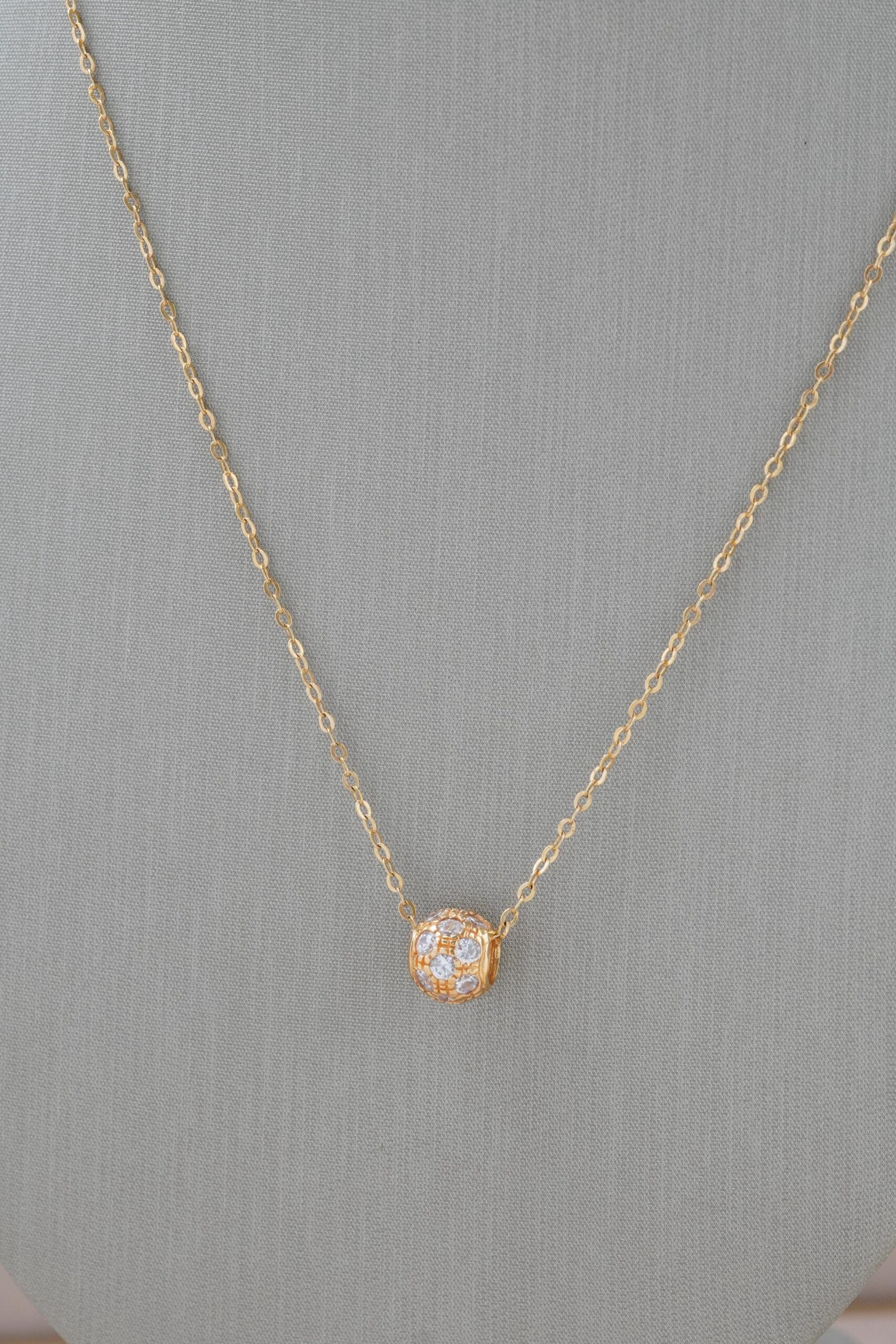 Collar bola de fuego con circones en oro amarillo 18k