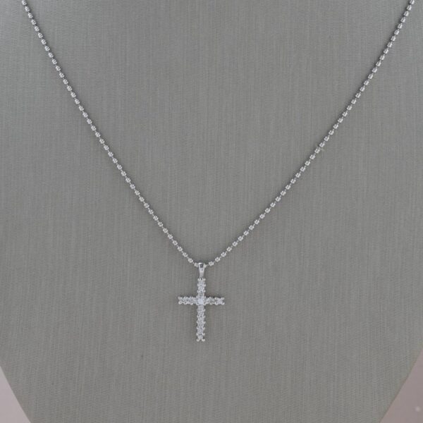 cruz de oro blanco con diamantes