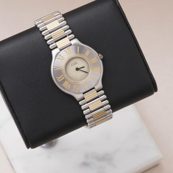 Must de cartier de acero y oro