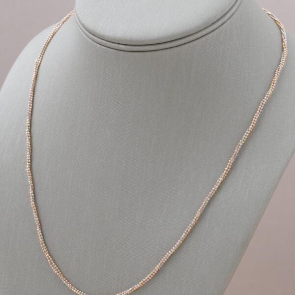 Collar entrelazado de tres oros 18k