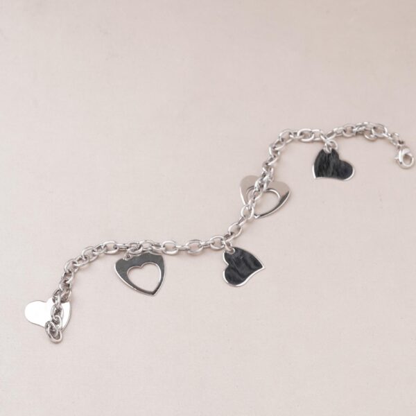 Pulsera corazones en oro blanco 18k