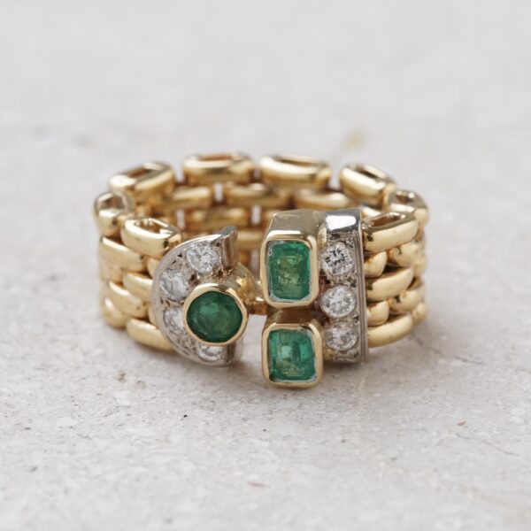 Anillo pantera de esmeraldas y diamantes en oro 18k