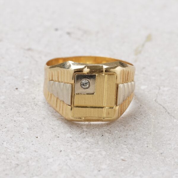 Anillo de diamante y dos oros 18k