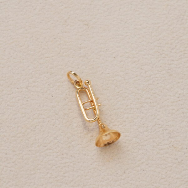 Trompeta en oro amarillo 18k