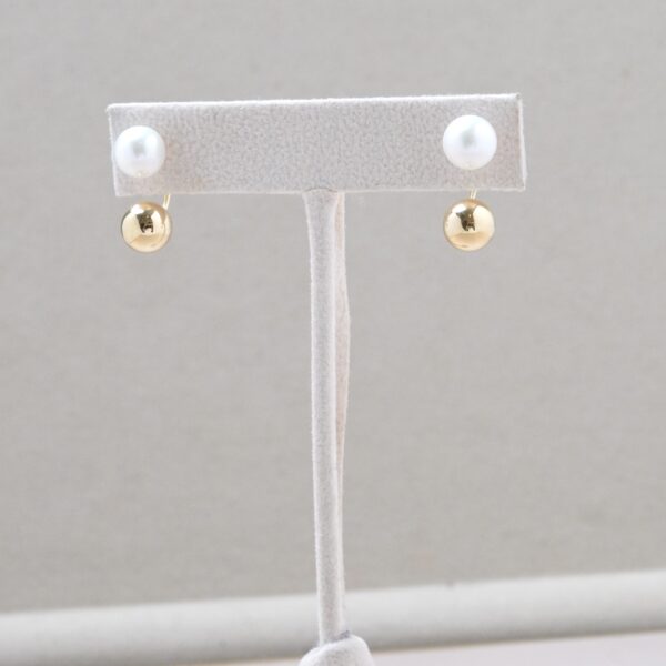 Aretes de oro amarillo y perla